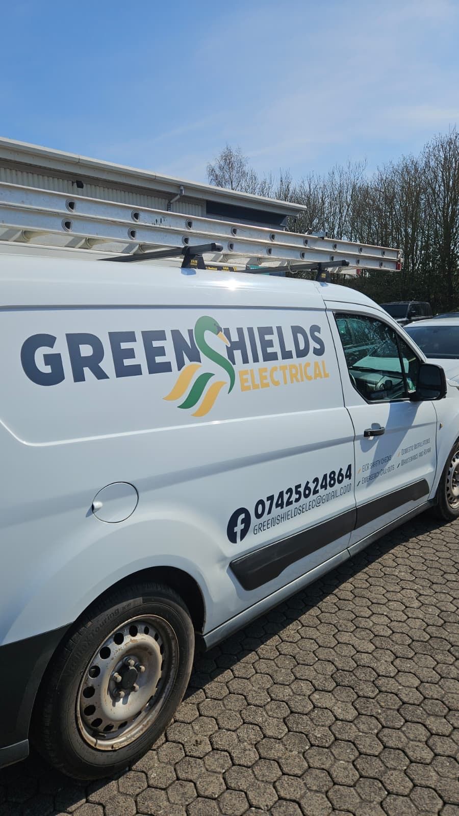 Rear view of the Greenshields Electrical work van